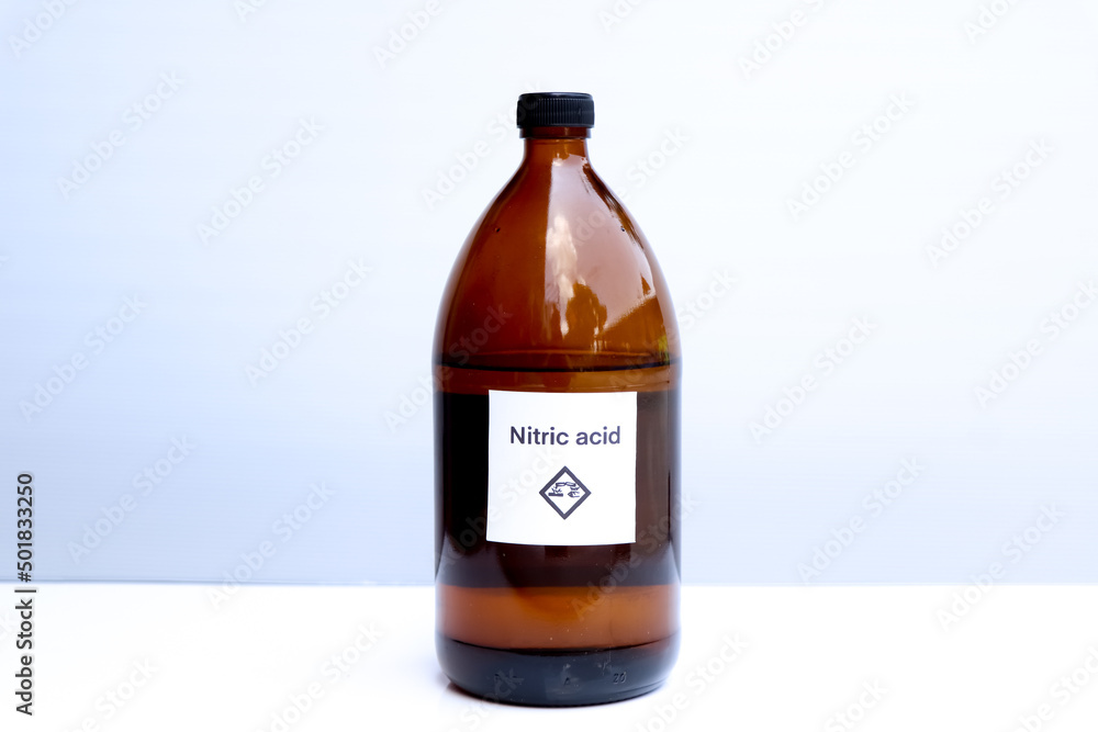 Nitric acid in bottle, chemical in the laboratory Nitric acid in bottle, chemical in the laboratory