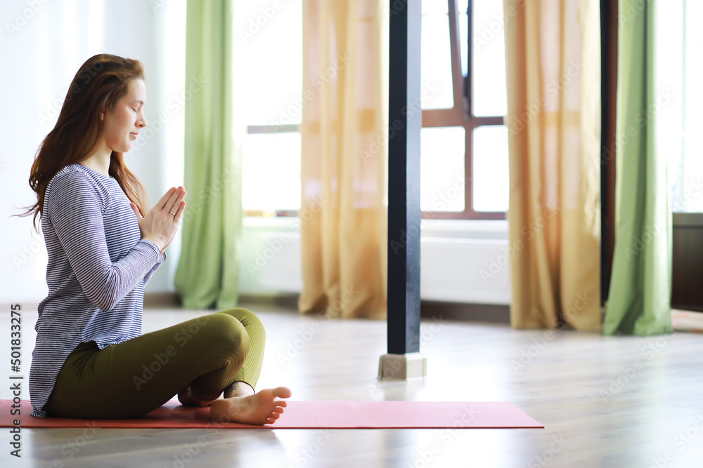 Attractive woman with perfect body in a sports clothes standing in a yoga pose. Concept of sports healthy lifestyle, nutrition and training workout. Attractive woman with perfect body in a sports clothes standing in a yoga pose. Concept of sports healthy lifestyle, nutrition and training workout.