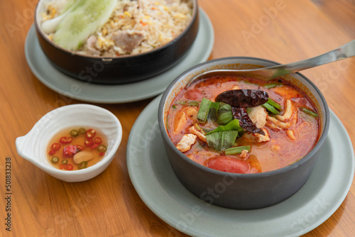 Thai hot spicy soup with pork and seafood as traditional Thai food for meal