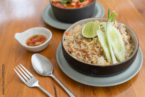 Fired rice with pork as Thai food style on wooden table