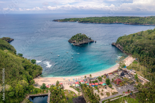 Aerial view of Crystal Bay Area located at Penida Island and Caningan Island located nearby, Klungkung Regency, Bali, Indonesia