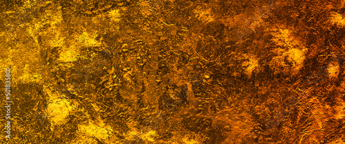 golden concrete texture, background texture in warm autumn colors, beautiful golden art widescreen background.