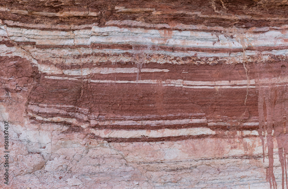 Naklejka premium rock from colored layers background