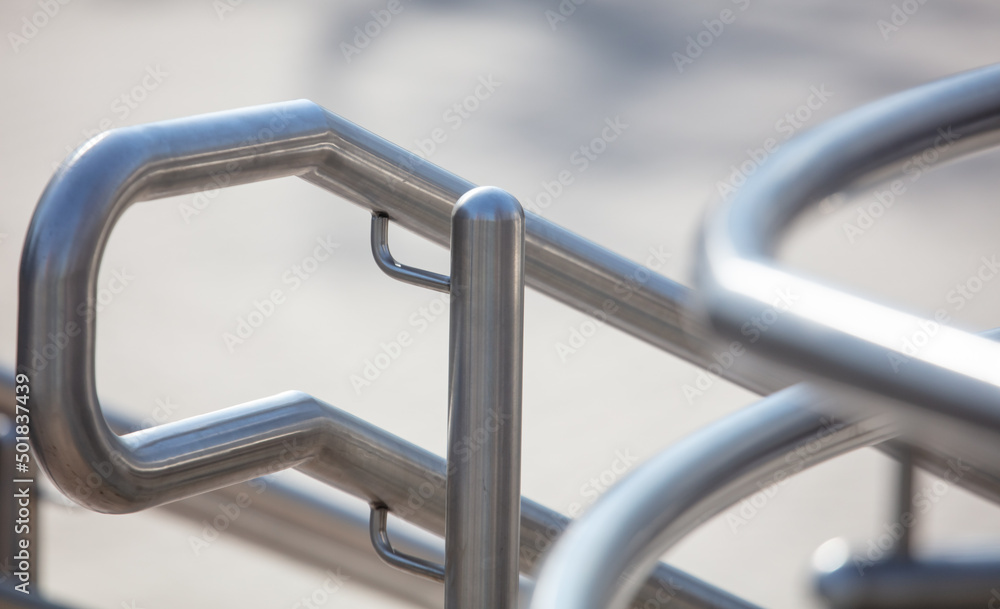 Metal railing on the stairs as a background
