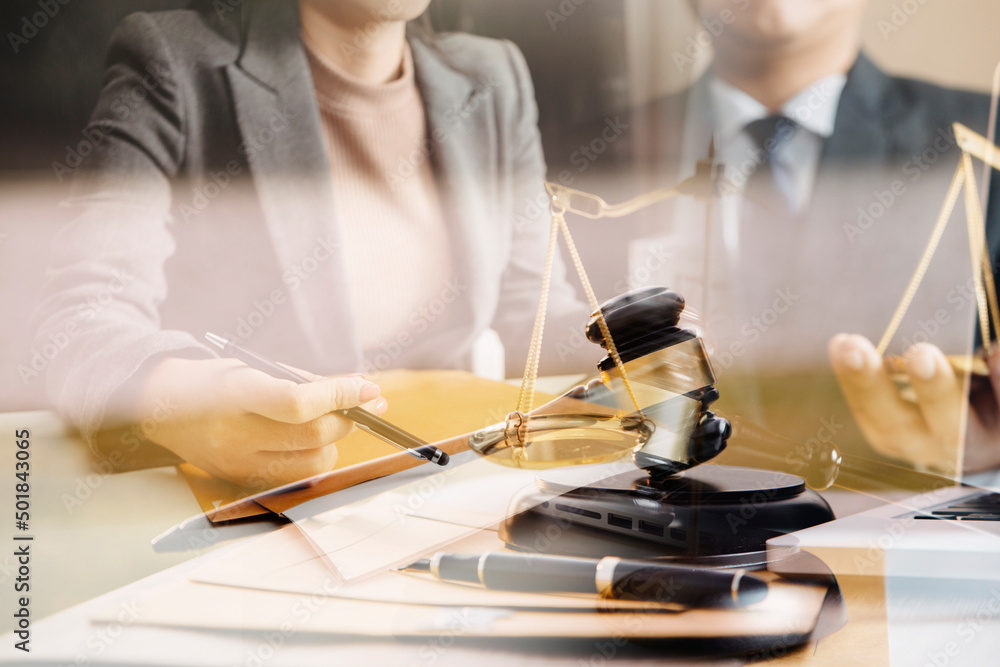 Judge gavel and legal book on wooden table, justice and law concept Judge gavel and legal book on wooden table, justice and law concept