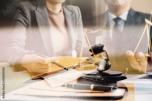 Judge gavel and legal book on wooden table, justice and law concept