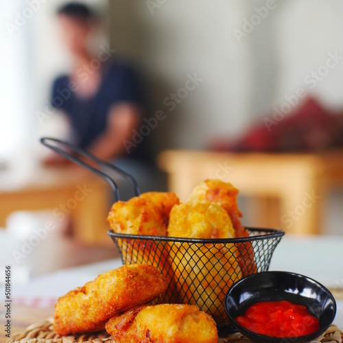 Selective focus risoles sosis mayo (American risoles) or mayonnaise sausage rissole is a small patty rolled in breadcrumbs. it is filled with mayonnaise, boiled egg and sausage. photo