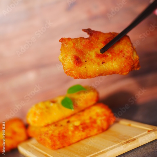 Selective focus risoles sosis mayo (American risoles) or mayonnaise sausage rissole is a small patty rolled in breadcrumbs. it is filled with mayonnaise, boiled egg and sausage. photo