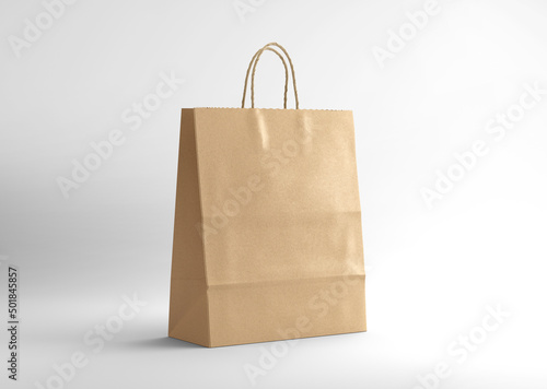 Blank kraft paper shopping bag on isolated background