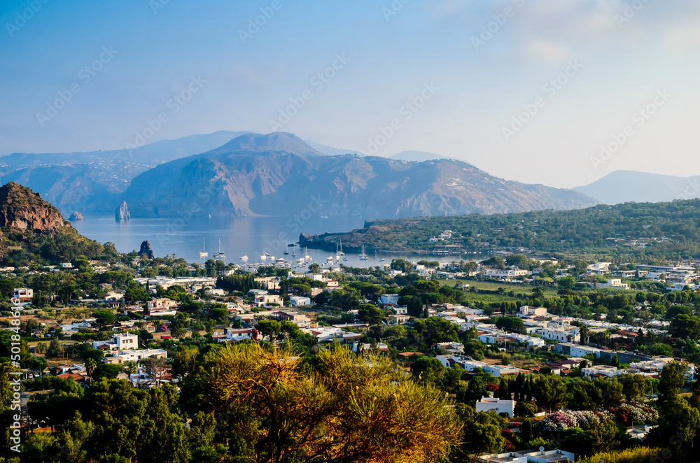 Panoramic aerial view of Lipari and Vulcanello from the top of the volcano crater of Vulcano island, Aeolian Islands Archipelago, Sicily, Italy
