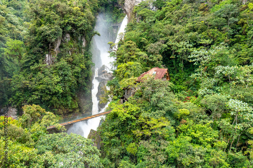 El Pailon del Diablo waterfall cascade and suspended bridge. Aerial view. Banos Santa Agua  Ecuador. South America.