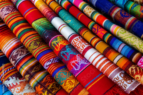 Photography Colorful Andean fabric textiles on the local souvenir market in Otavalo, Ecuador