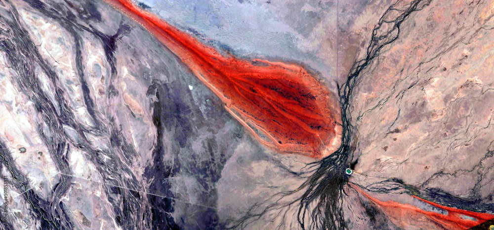 Obraz premium abstract landscape photo of the deserts of Africa from the air emulating the shapes and colors of the apocalypse, Genre: Abstract naturalism, from the abstract to the figurative