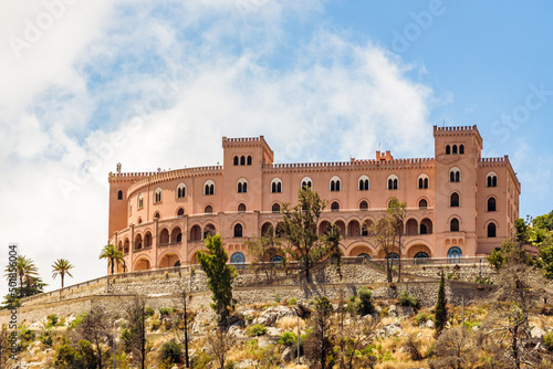 View of the Castello Utveggio on the hill of Pellegrino, mount on a clear sunny day. Palermo, Sicily. photo