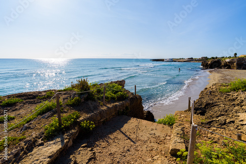 Tableau sur toile Beautiful crystal clear water at Cittadella dei Maccari, San Lorenzo, Nature Reserve Oasis of Vendicari, Syracuse, Sicily, Italy, Dreamy and idyllic spring holiday destination near Noto and Marzamemi