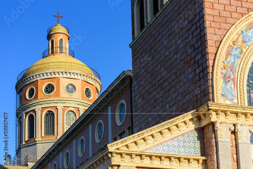 Facade and dome of the Tindari Sanctuary, built on a cliff with sheer drop on the sea and panoramic views of the Aeolian Islands and the gulf of Patti. The church hosts a statue of the Black Madonna.
