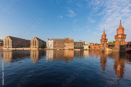 Photography cityscape view of Berlin Kreuzberg  as seen from across the river Spree, with the Oberbaum Brücke on the right