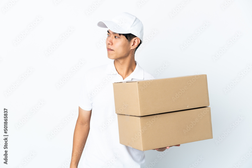 Delivery Chinese man isolated on white background . Portrait Delivery Chinese man isolated on white background . Portrait