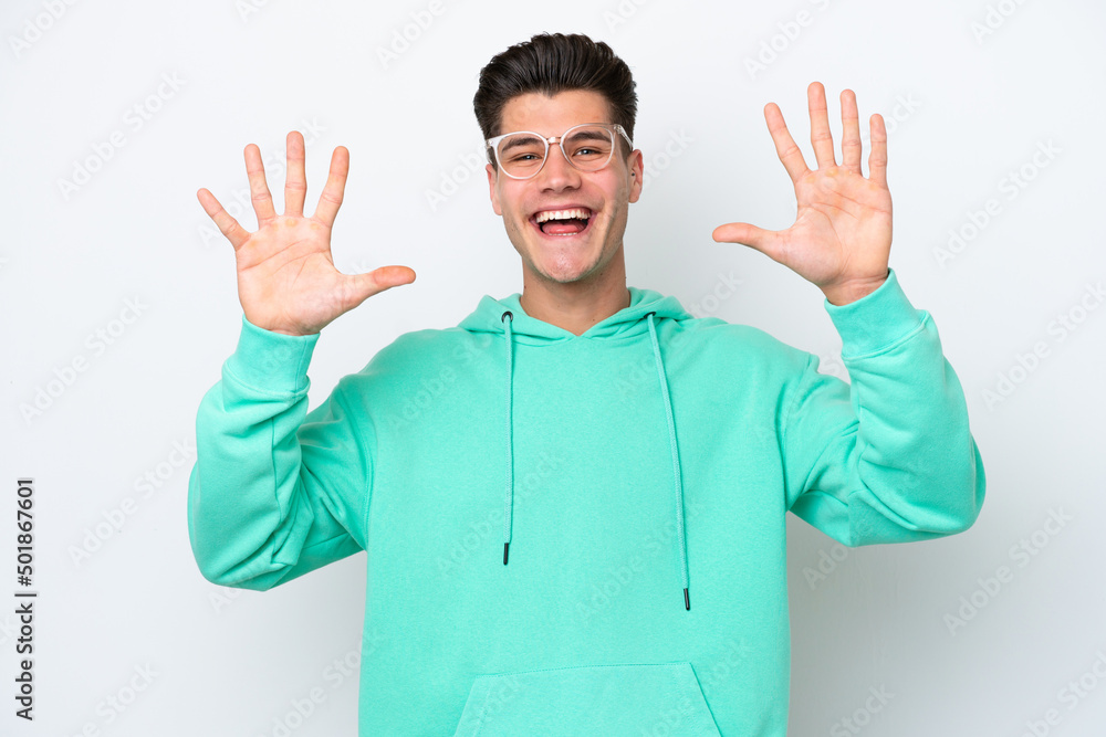 Young handsome caucasian man isolated on white bakcground counting ten with fingers Young handsome caucasian man isolated on white bakcground counting ten with fingers