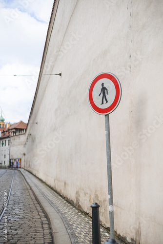 pedestrian crossing sign next to stone wall, Mala Strana, Prague, Czech Republik