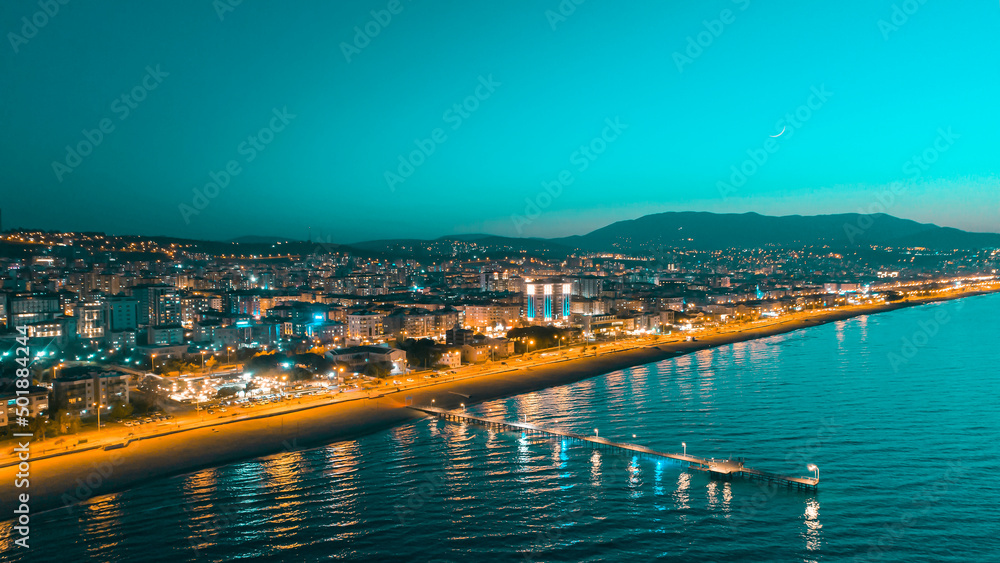 City and beach view taken with drone from Atakum district of Samsun in the evening. Atakum night scene and sunset 