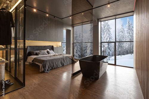 Canvas a bedroom and a free-standing bath in a chic expensive interior of a luxurious c