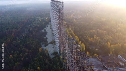 Drone footage of the top of the Duga radar in Chernobyl with dense forest below