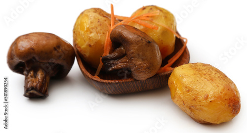 Fried potatoes and button mushroom