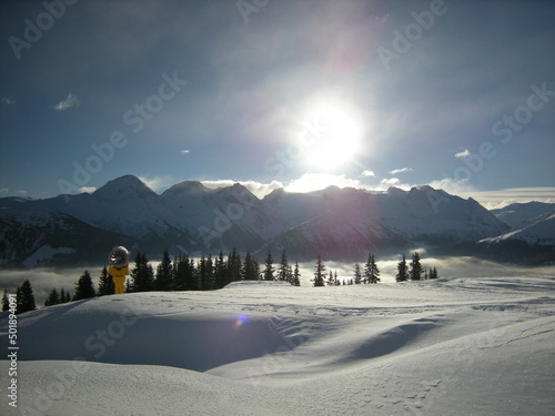 A Morning in the swiss skiresort Disentis with best weather and a sea of fog photo
