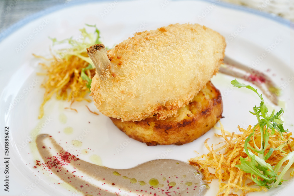 Chicken Kiev, meat cutlet with mashed potatoes and herbs. Shallow depth of field Chicken Kiev, meat cutlet with mashed potatoes and herbs. Shallow depth of field