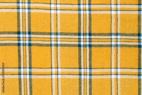 yellow checkered flannel material for textile background photo