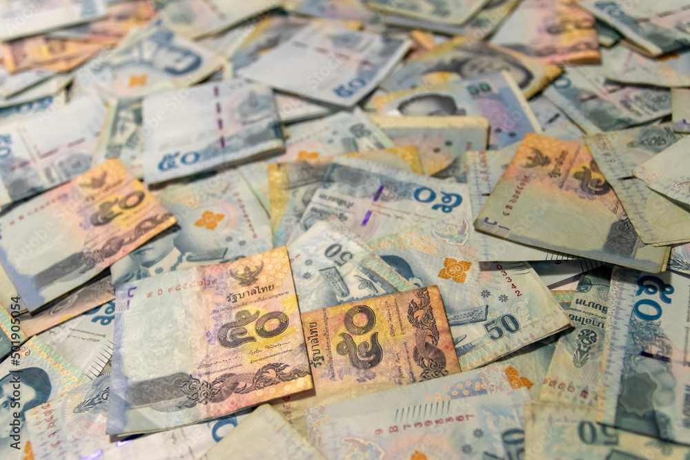50 Thailand (THB) banknotes. The baht is the official currency of Thailand. 50 Thailand (THB) banknotes. The baht is the official currency of Thailand.