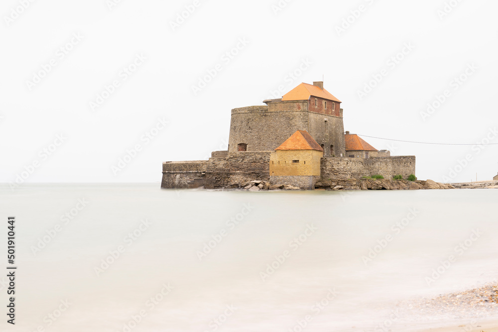 18th century Fort Vauban, in Ambleteuse near Boulogne on the Opal Coast in France in a milky white and grey sea