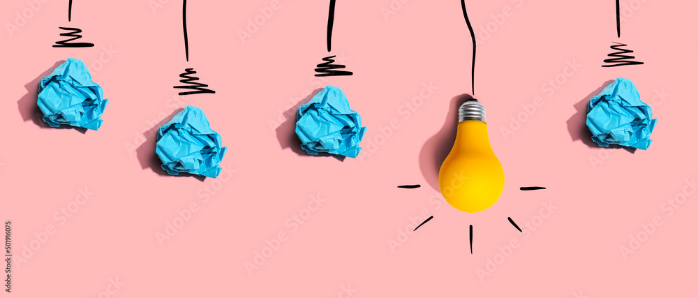 Brainstorming concept with crumpled paper light bulbs - Flat lay - obrazy, fototapety, plakaty 