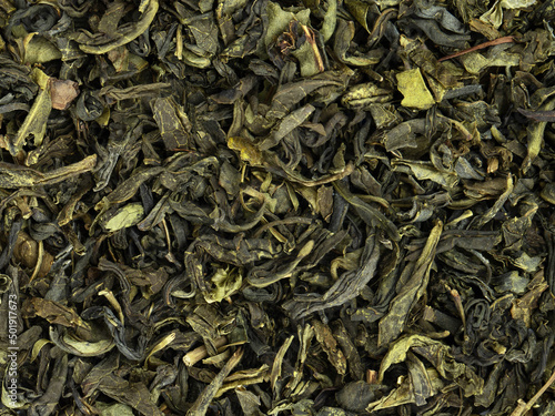 Dry green tea leavs background and texture