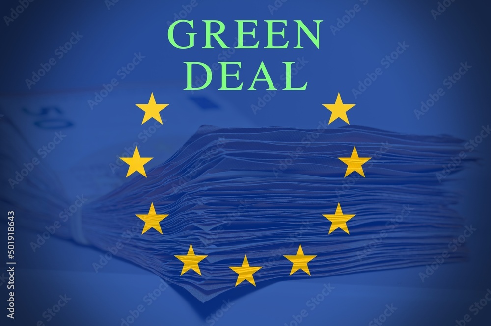 Pile of fifty euros on the table , with european flag and text Pile of fifty euros on the table , with european flag and text