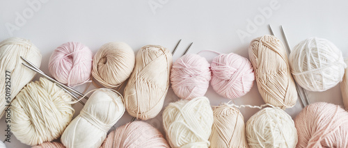 Skeins of yarn, knitting needles, accessories for knitting. Handmade, hobby photo