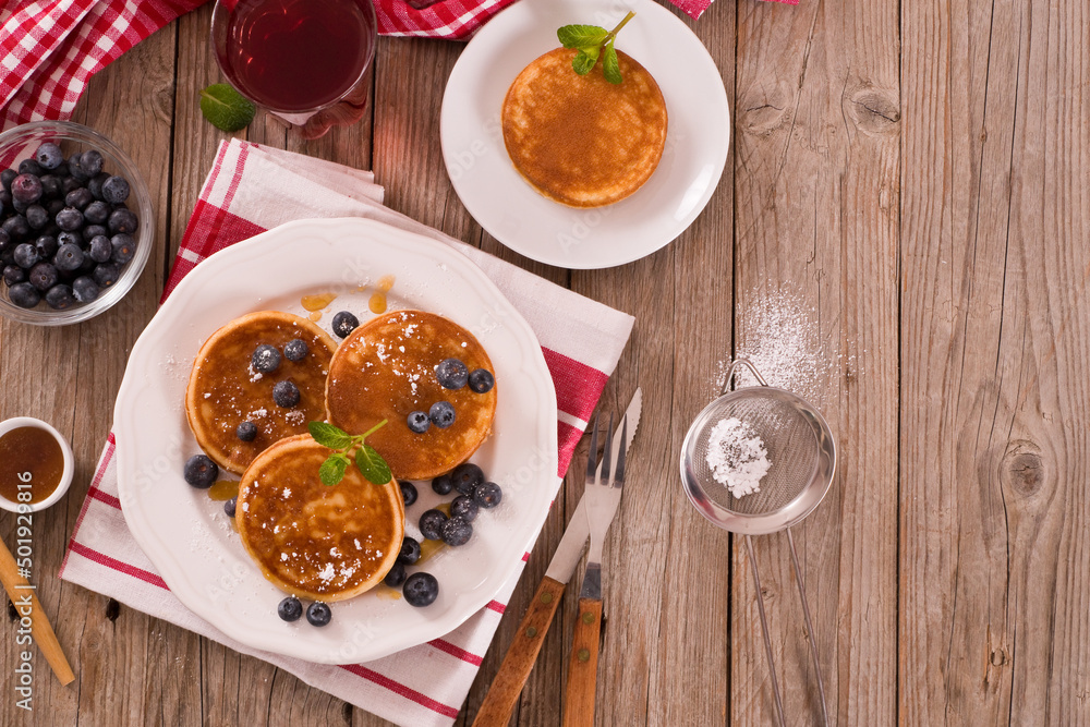 Pancakes with blueberries and chocolate cream. Pancakes with blueberries and chocolate cream.