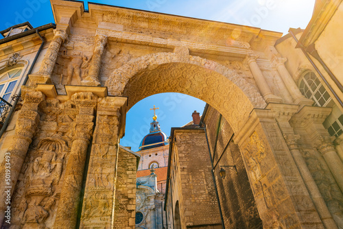 Fototapeta Naklejka Na Ścianę i Meble -  The Porte Noire archway in Besancon, with St. Jean Cathedral in the background.