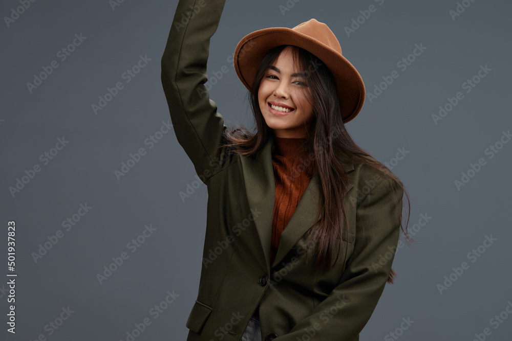 portrait woman brown hat hand gestures fashion emotions Gray background portrait woman brown hat hand gestures fashion emotions Gray background