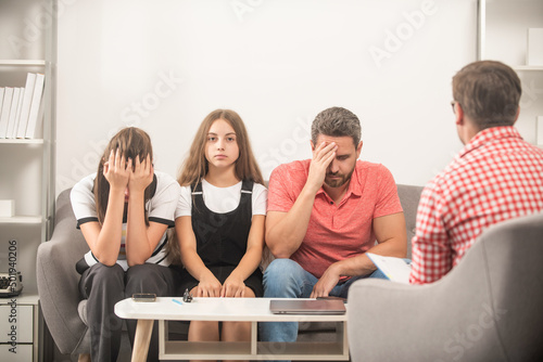 psychologist give family therapy for dad mom and daughter girl, consultant photo