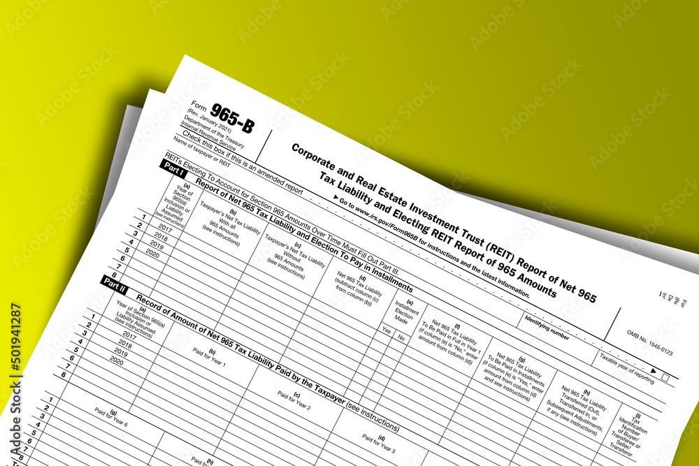 Form 965-B documentation published IRS USA 43842. American tax document on colored Form 965-B documentation published IRS USA 43842. American tax document on colored