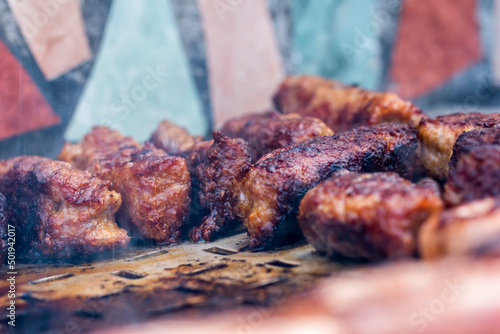 Traditional Romanian food called "mici" which consist of pork meat rolls