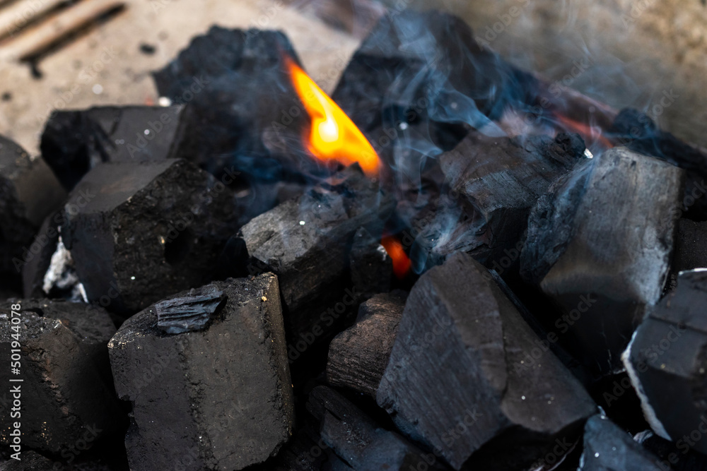 Close up shot of burning wood and charcoal used for barbeque Close up shot of burning wood and charcoal used for barbeque