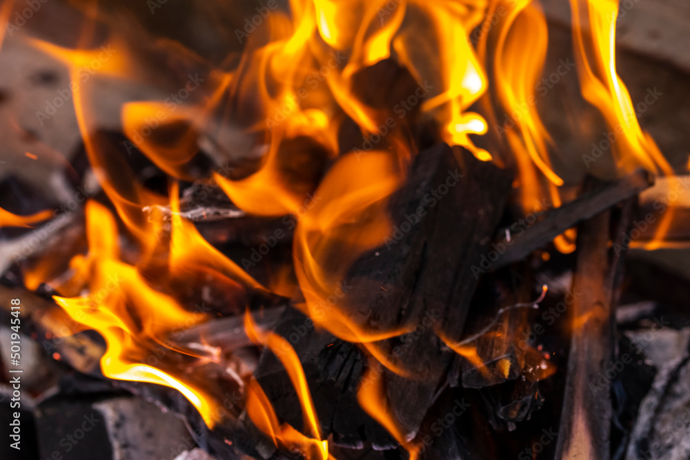 Close up shot of burning wood and charcoal used for barbeque Close up shot of burning wood and charcoal used for barbeque