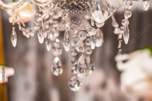 Indian wedding reception beautiful crystal chandeliers © Stella Kou