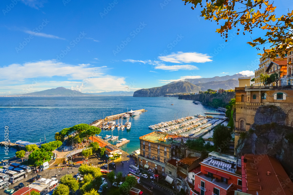 View of the bay, harbor, marina and colorful town of Sorrento, Italy, from a terrace overlooking the Mediterranean Sea and Mt Vesuvius	