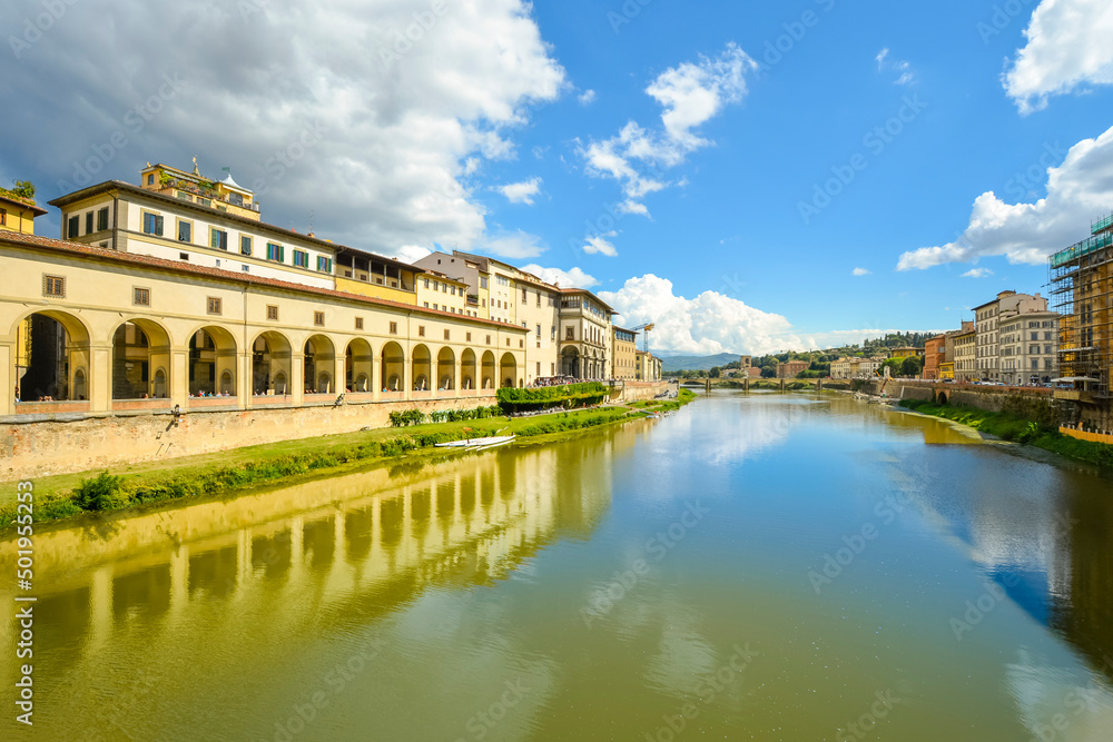 The Uffizi Gallery and the Arno River seen from the historic Ponte Vecchio bridge on the Arno River in Florence Italy	