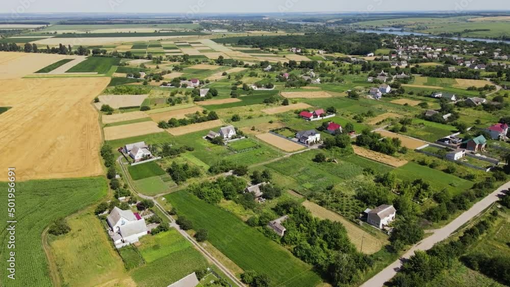 Aerial view of a Houses and Sown Fields
Aerial view of a Houses and Sown Fields
