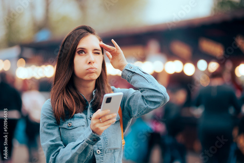 Forgetful Woman using Phone App as Reminder 